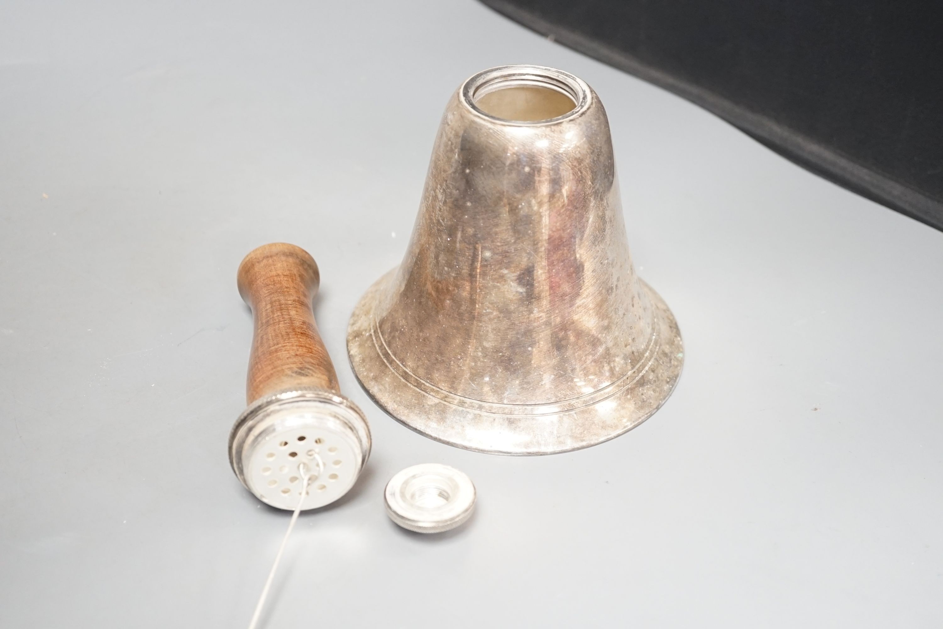 A Dunhill style novelty silver-plated cocktail shaker modelled as a hand bell, 27cm